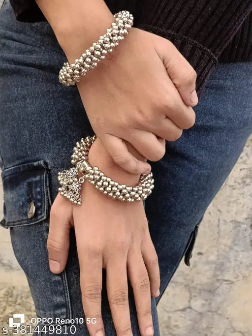 Elegant Oxidized Silver Beaded Bangles with Peacock Charm (Set of 2)